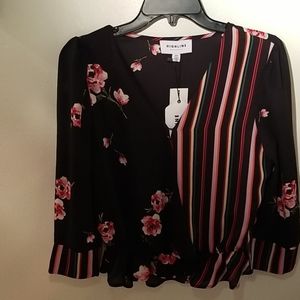 Highline wrap style blouse with bottom ruffle